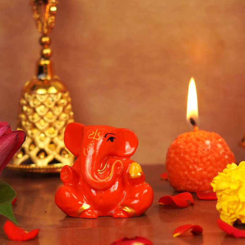 Orange Gifting Small Ganesha Resin Idol 2 inches