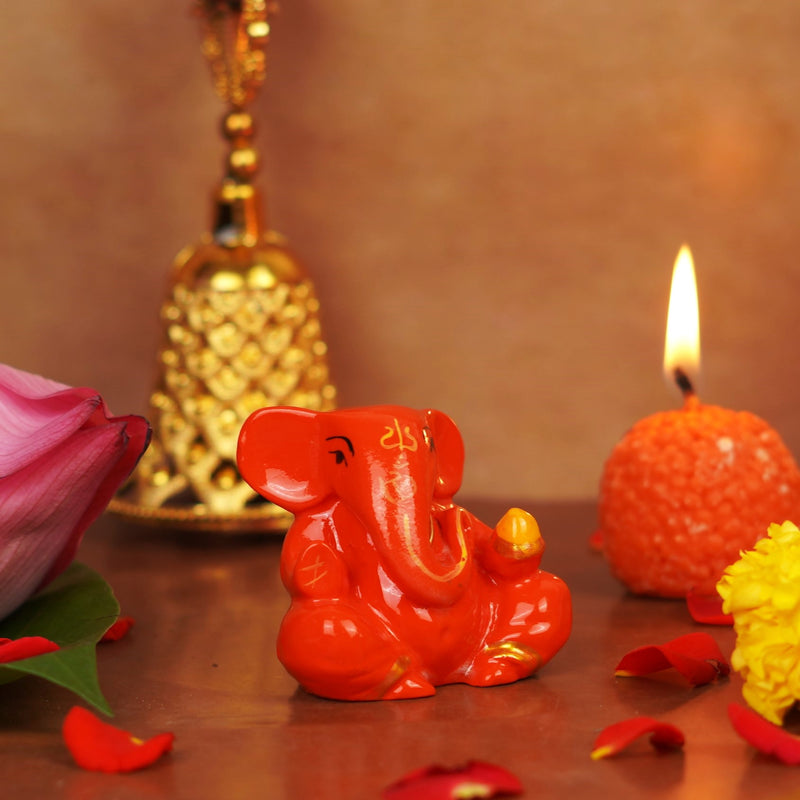 Orange Gifting Small Ganesha Resin Idol 2 inches