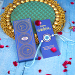 Handcrafted Evil Eye Beaded Rakhi with Dual Panel Design and Satin Thread and Pearl Accents