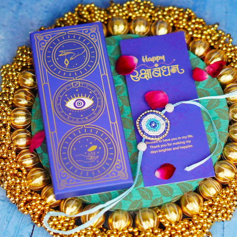 Handcrafted Evil Eye Beaded Rakhi with Dual Panel Design and Satin Thread and Pearl Accents