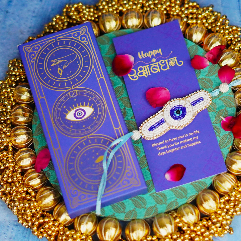 Handcrafted Evil Eye Beaded Rakhi with Dual Panel Design and Satin Ties in Aqua Blue