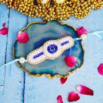 Handcrafted Evil Eye Beaded Rakhi with Dual Panel Design and Satin Ties in Aqua Blue