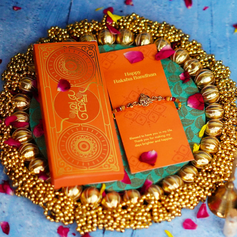 Ethnic Red Drop Bead & Om Rakhi with Metal Finish