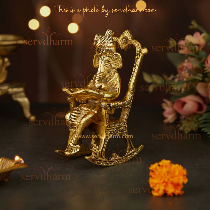 Metal Lord Ganesha Statue Reading and Sitting on Rocking Chair
