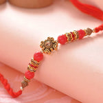 Floral Pattern & Red Beads Rakhi