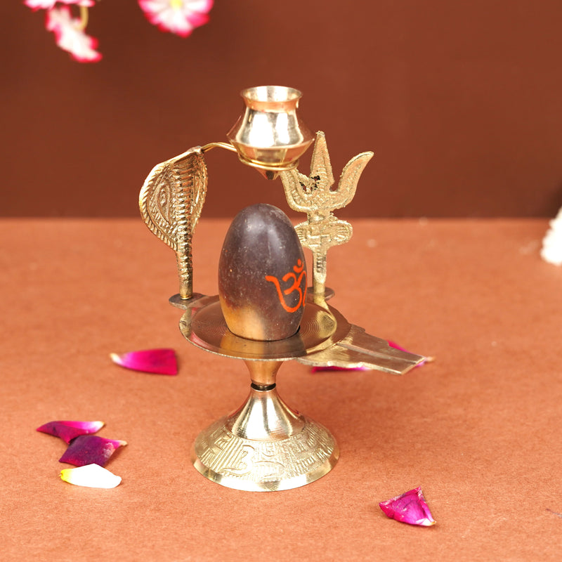 Natural Stone Narmadeshwar Shivling with Small Golden Trishul & Temple Figurine (6 Inch)